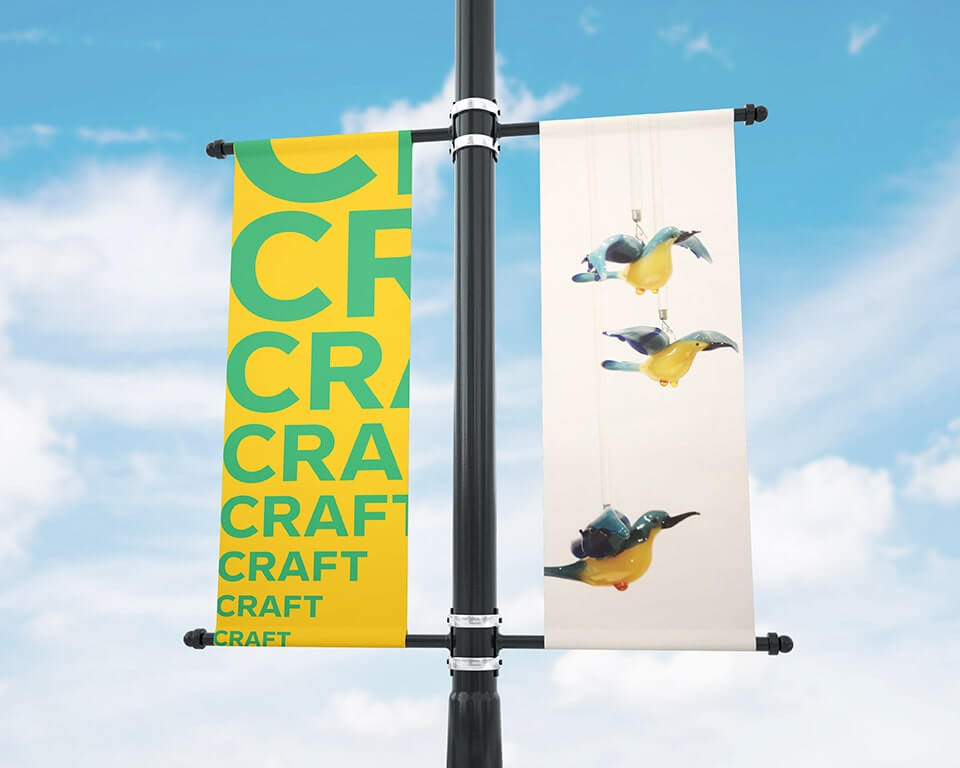 Photo of double-sided flag poles showing SAF 2019 branding